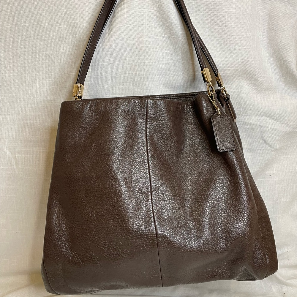 Coach brown leather shoulder bag with purple inside